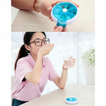 Load image into Gallery viewer, Rotating 7 days Travel Pill Box Medicine Tablet Storage
